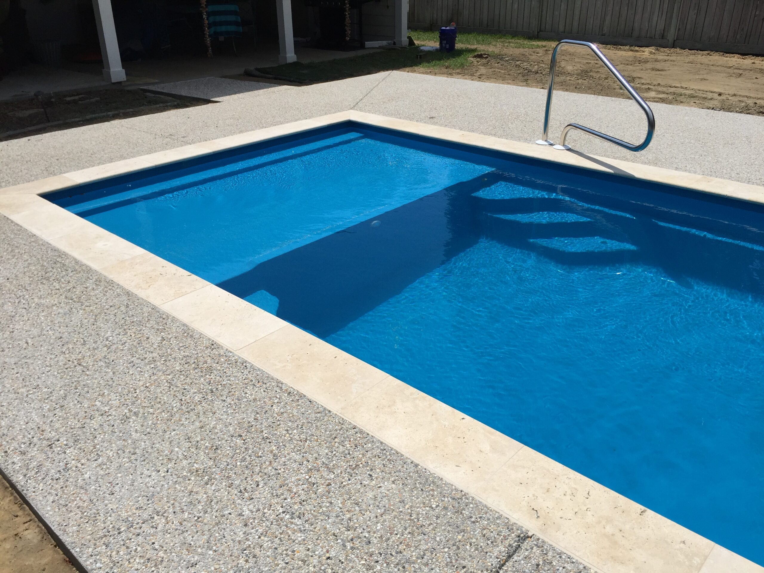 Professional pool company services in Inez, TX backyard