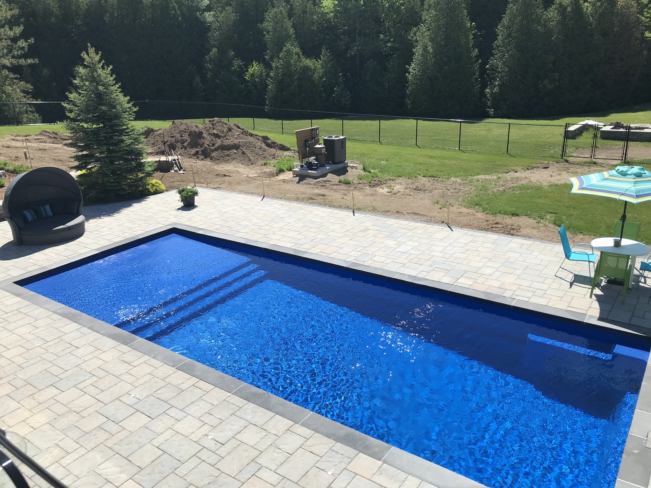 Fiberglass pool installation by Copano Pools and Spas